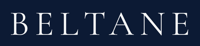 logo Beltane Artiste florale en typologie script ponctuée d'une feuille végétale